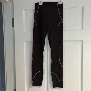 Lululemon Brown High-Waisted Leggings with Gold Detailing
